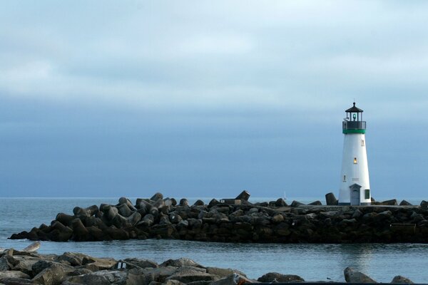 Lighthouse on the background of the evening sky