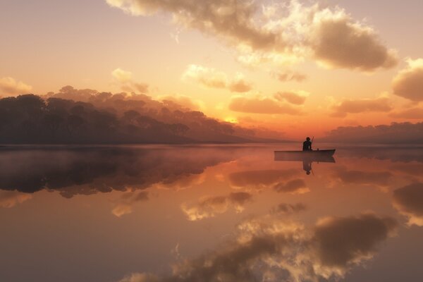 Pescador en un barco en un lago de niebla