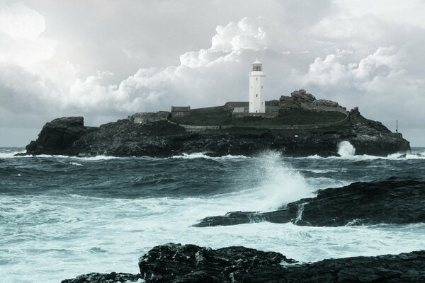 View of the lighthouse in a sea storm