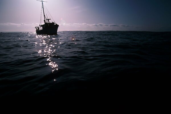 The boat is moving into the sea