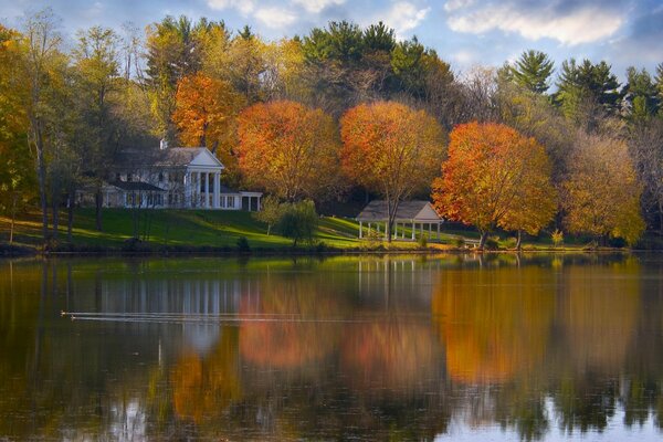 House on the water with a garden