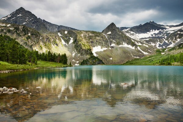 A lively landscape of mountains and forests