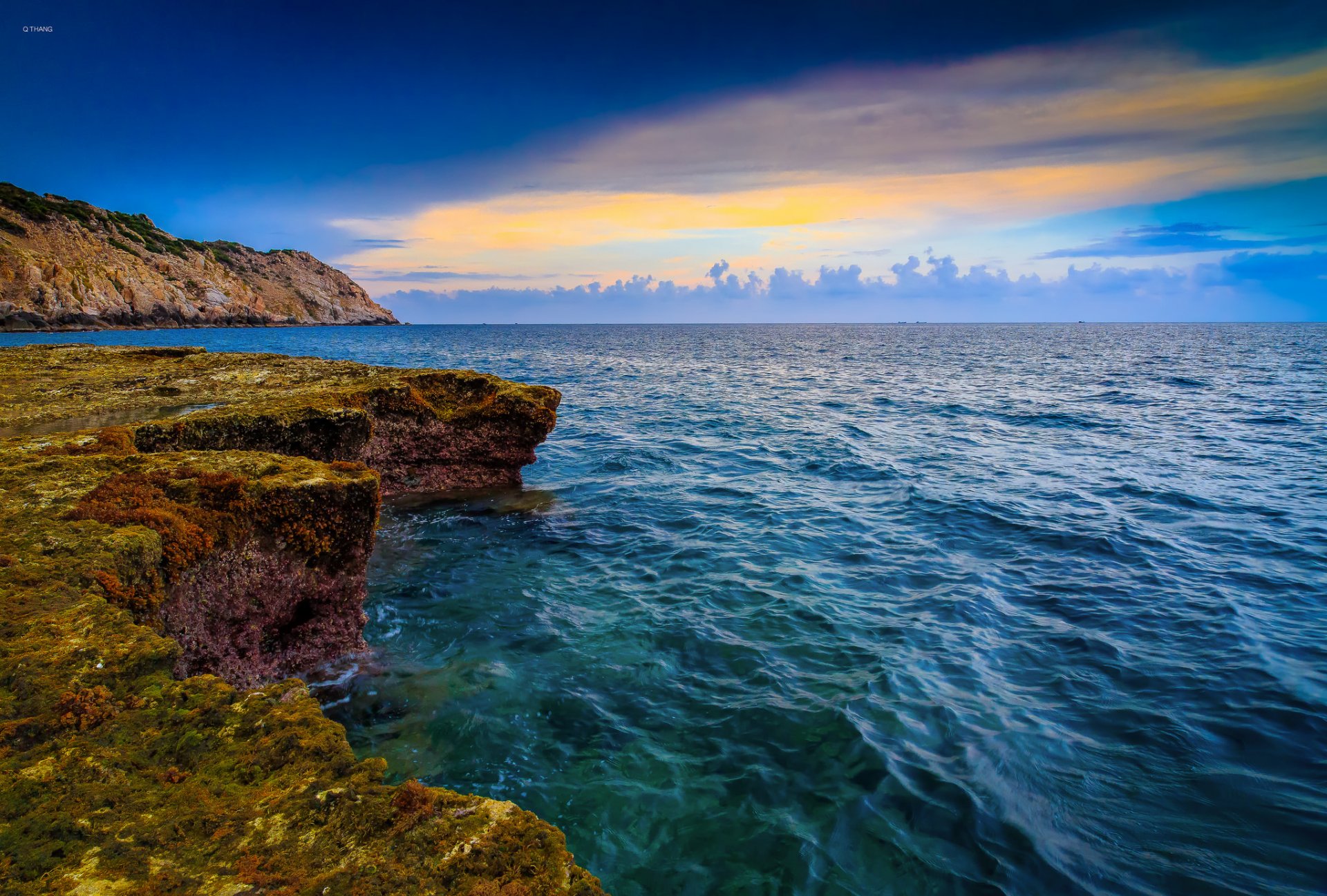 cielo nubes puesta de sol montañas rocas mar