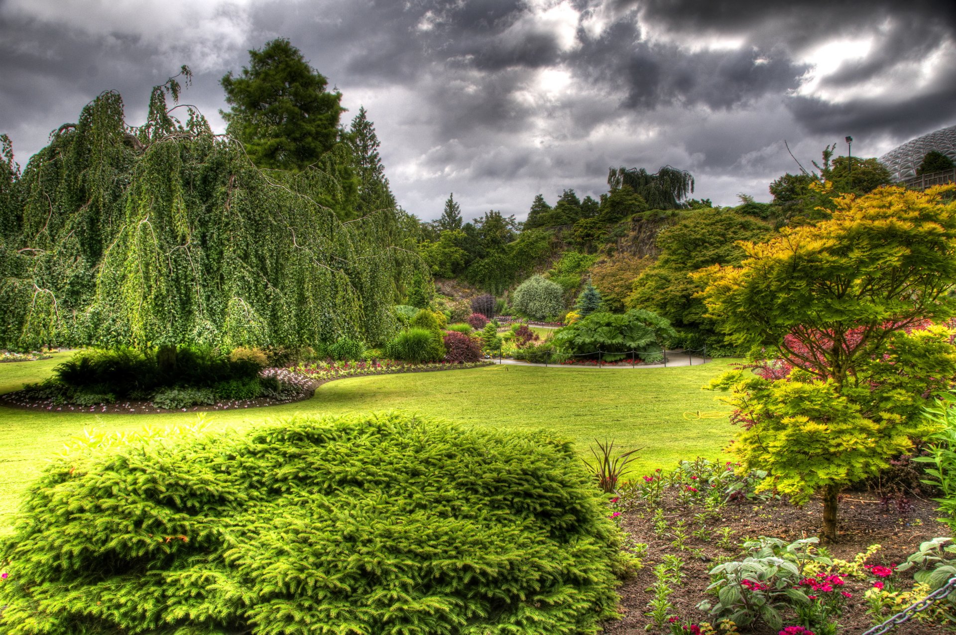 queen elizabeth garden vancouver canada supplies lawn beds flower bush grass green clouds rain processing