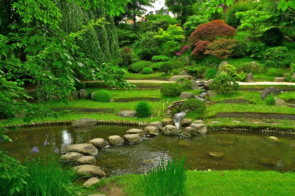 Green summer Japanese gardens of France