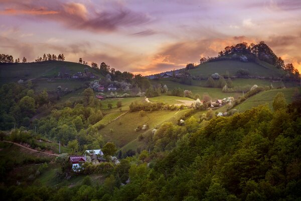 Village on the hills in spring in Romania