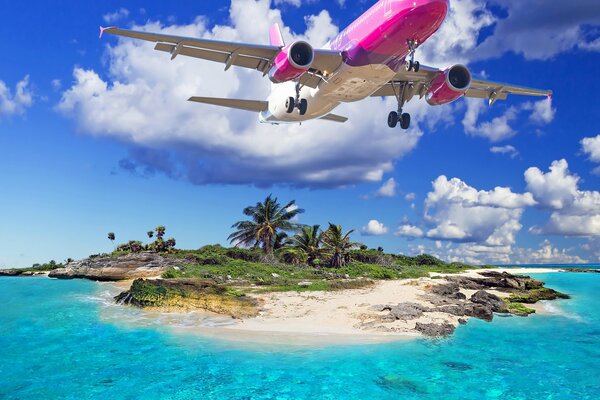 Flying plane over a tropical island