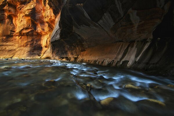 Rocky canyon in a cave by the river