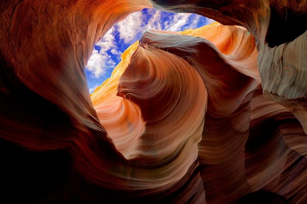 The blue sky is visible through the canyon gap