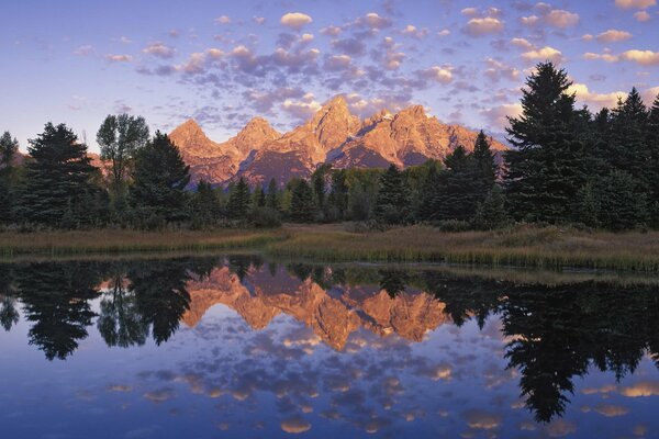 Reflection of mountains in a clear lake