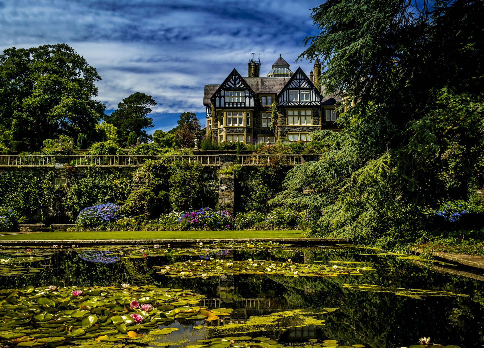 upplies pond water house tree bush green bodnant gardens wales united kingdom