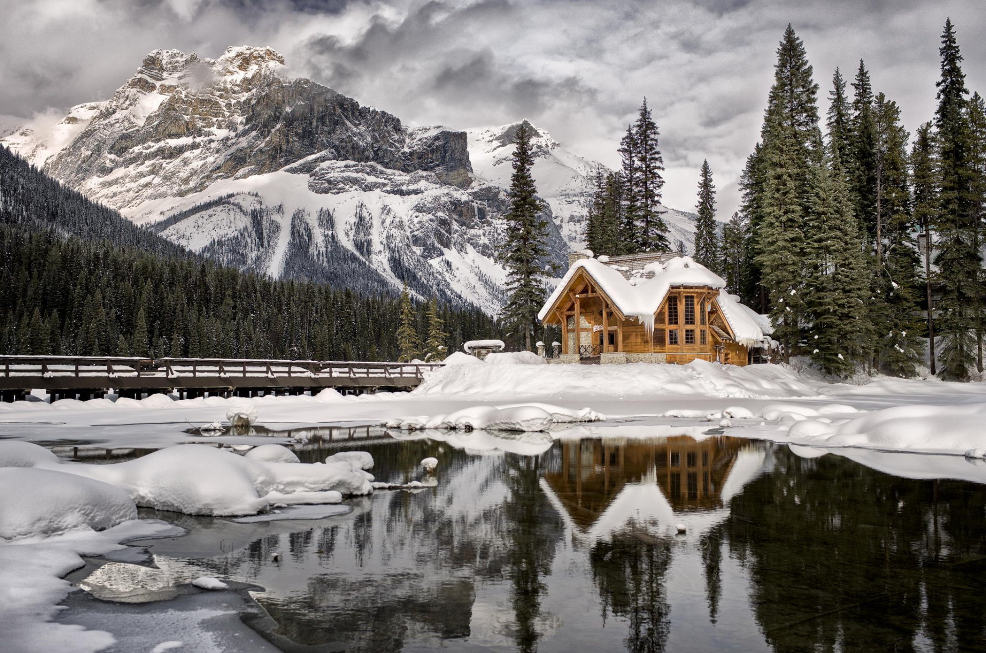 winter snow mountain tree hut lake bridge