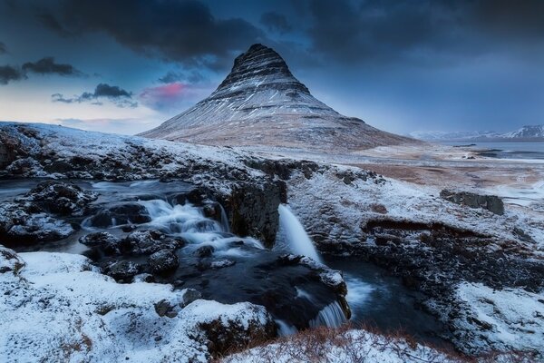 Snow rocks and volcano in Iceland