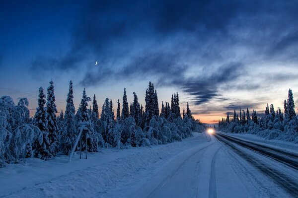 Winter sunset with a road for cars