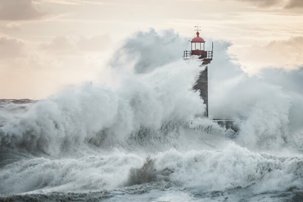 Lighthouse tower in a stormy sea