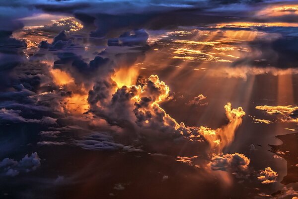 Rays of light break through heavy clouds