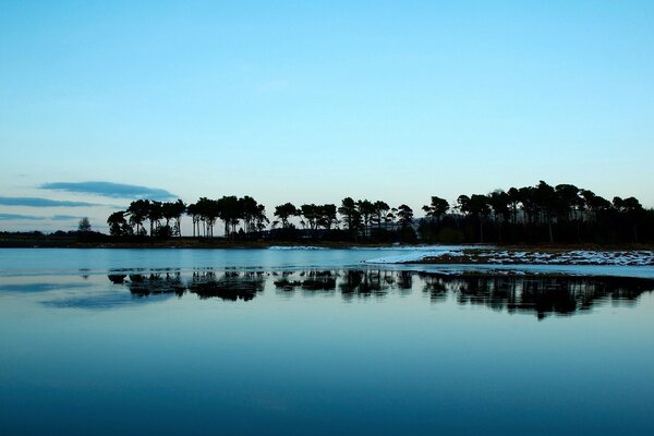 Evening landscape with the sea, calm