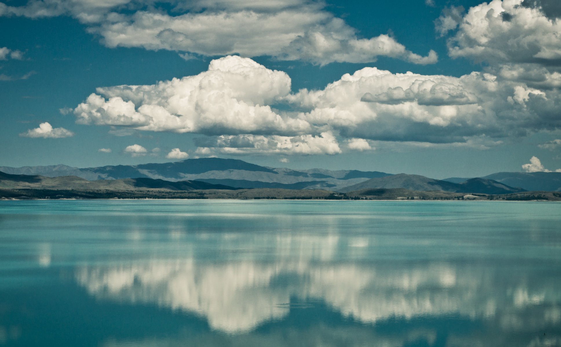 berge see wolken reflexion