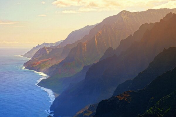 Landscape of mountains in the sky with a haze