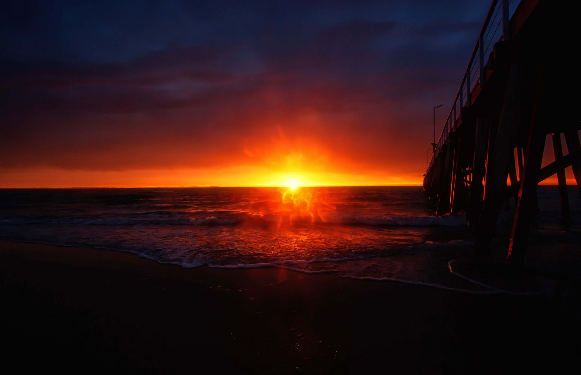 sonnenuntergang pier brandung