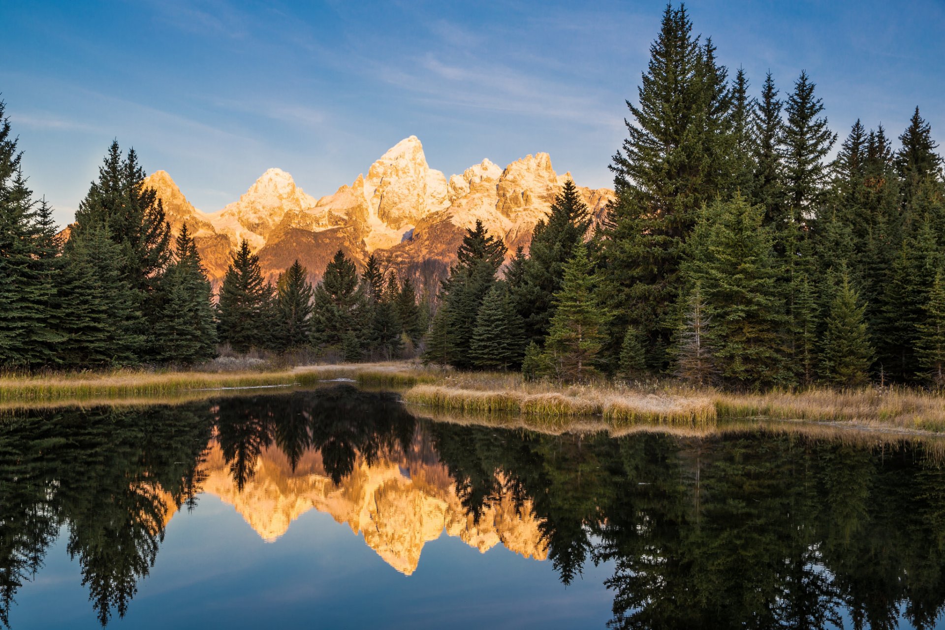 estados unidos wyoming parque nacional grand teton montañas río bosque mañana cielo nubes reflexión