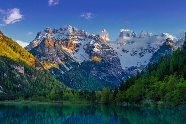 Mountain landscape, lake and snow