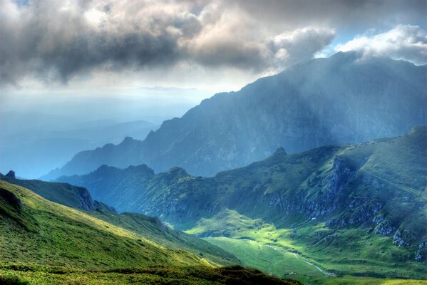 Mountain valley under the rays of the sun