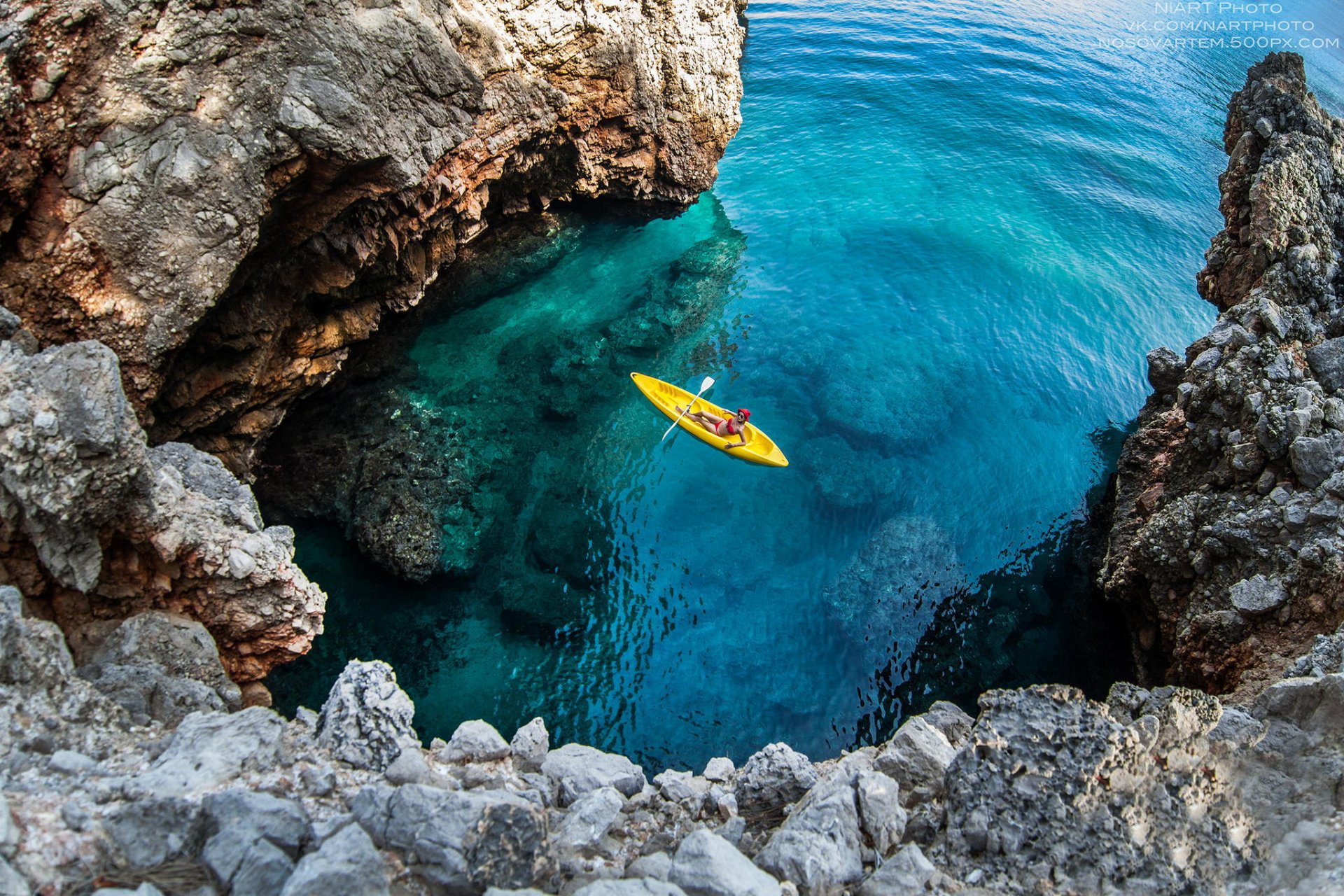 landscape ocean stones rock girl canoe