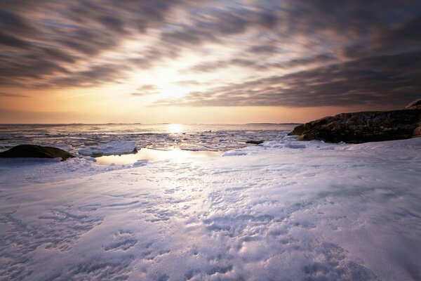 The sun illuminates the glaciers in the morning