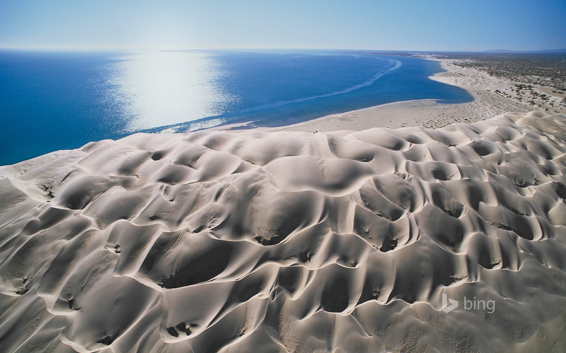 landscape sea sun sand dune sky reflection