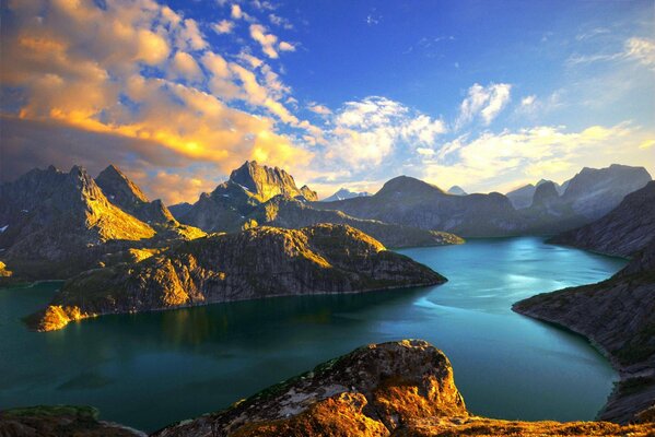 Sunset on the lake among the mountains