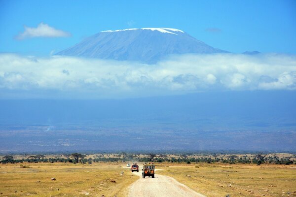 African landscape with car and mountains