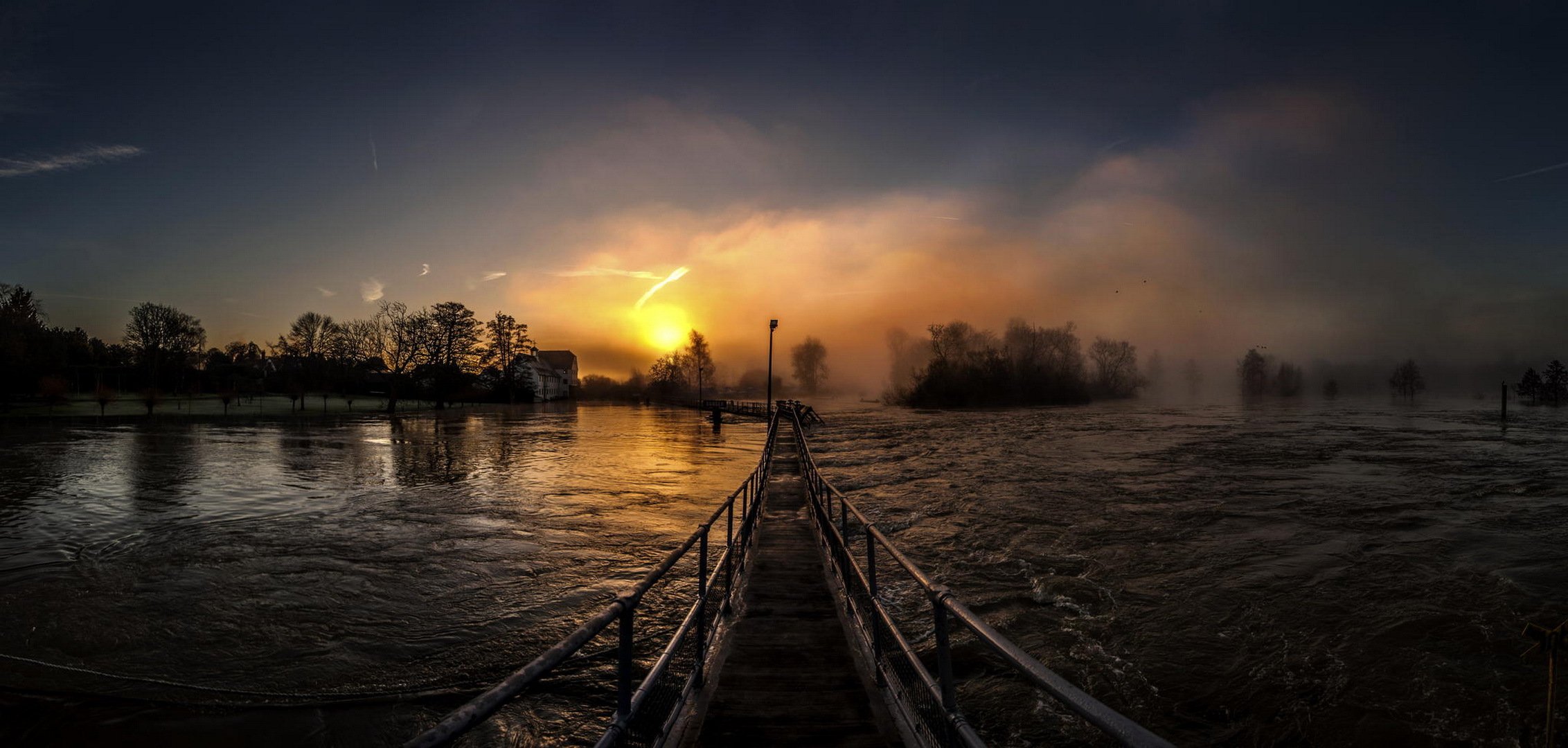 fiume ponte alba sole