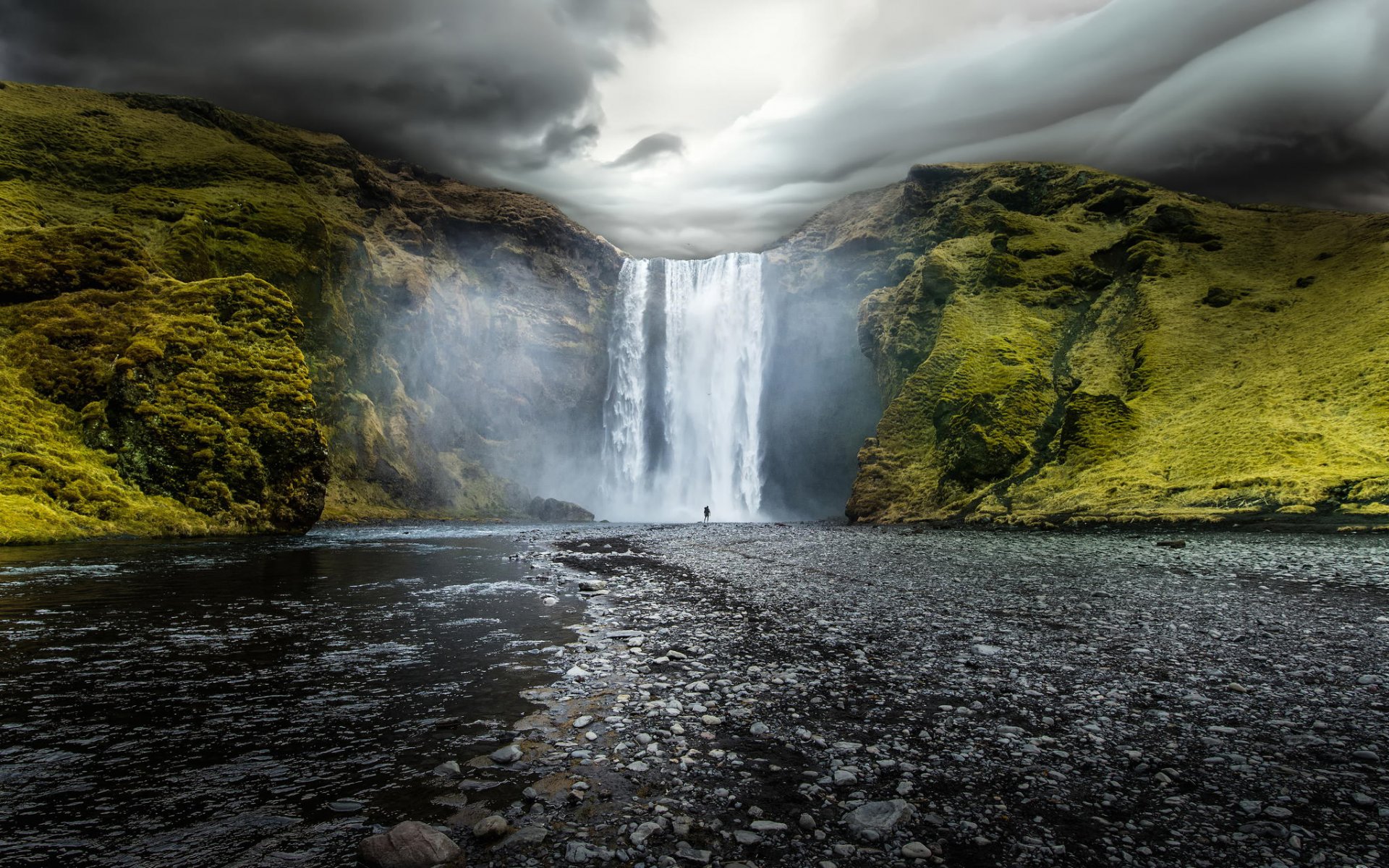 islanda skogafoss cascata skogafoss rocce fiume acqua nuvole natura