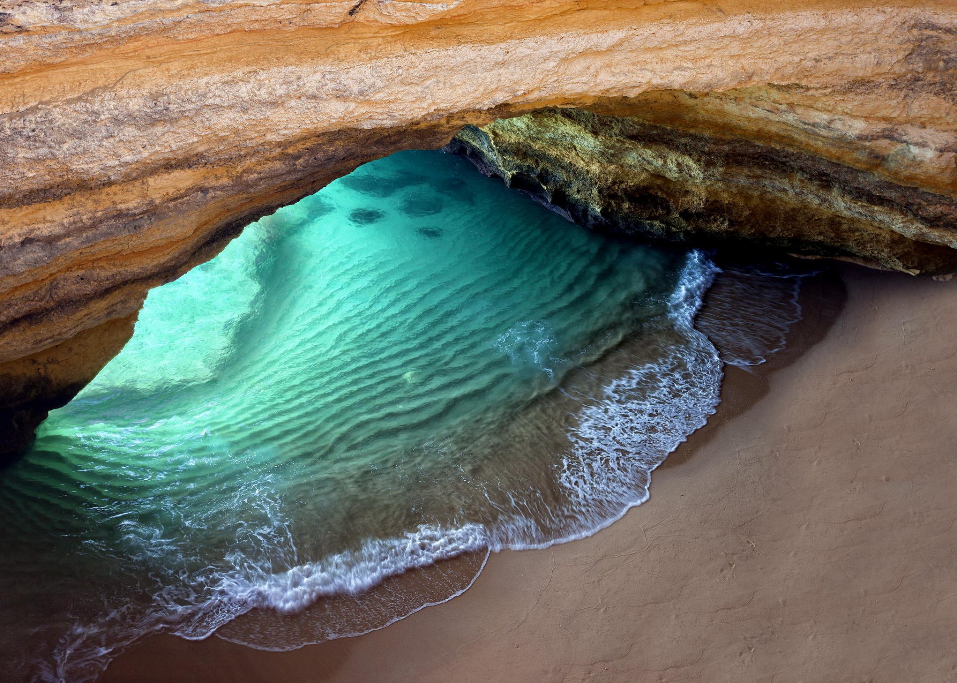 océano playa gruta roca