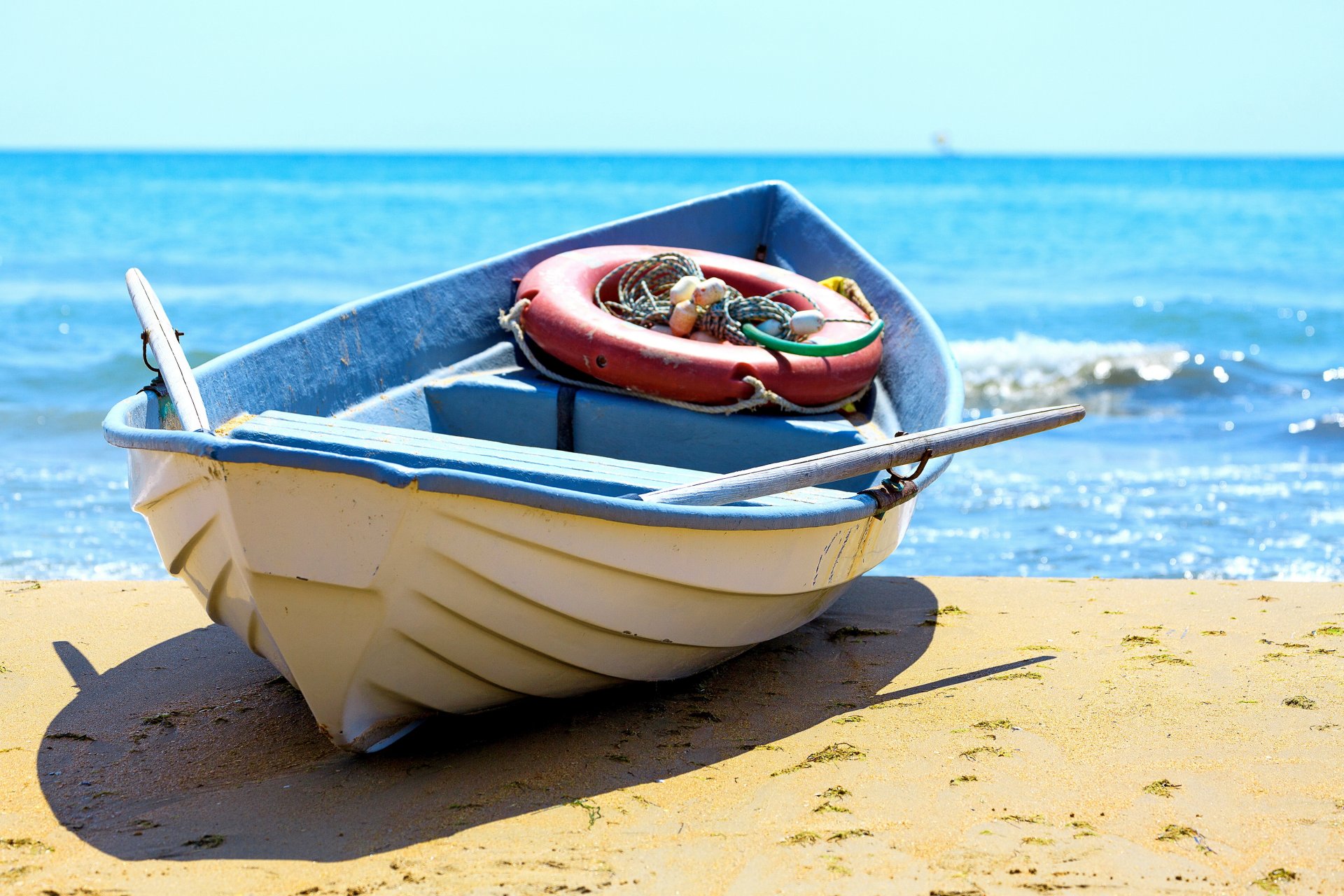 fishing boat sand beach sea boat shore