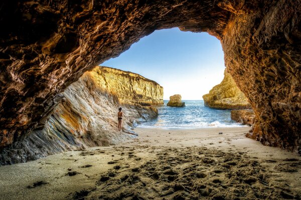 Mysterious grotto to paradise beach