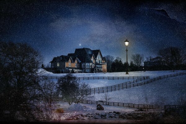 A lonely lantern at a country house