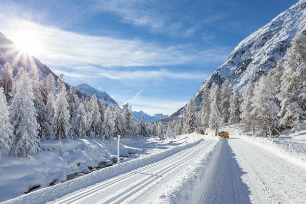 Snow-covered mountain road