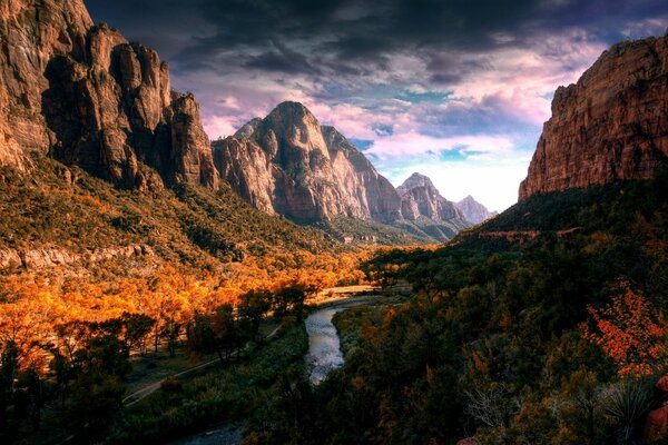 Autumn nature in the mountains with a river