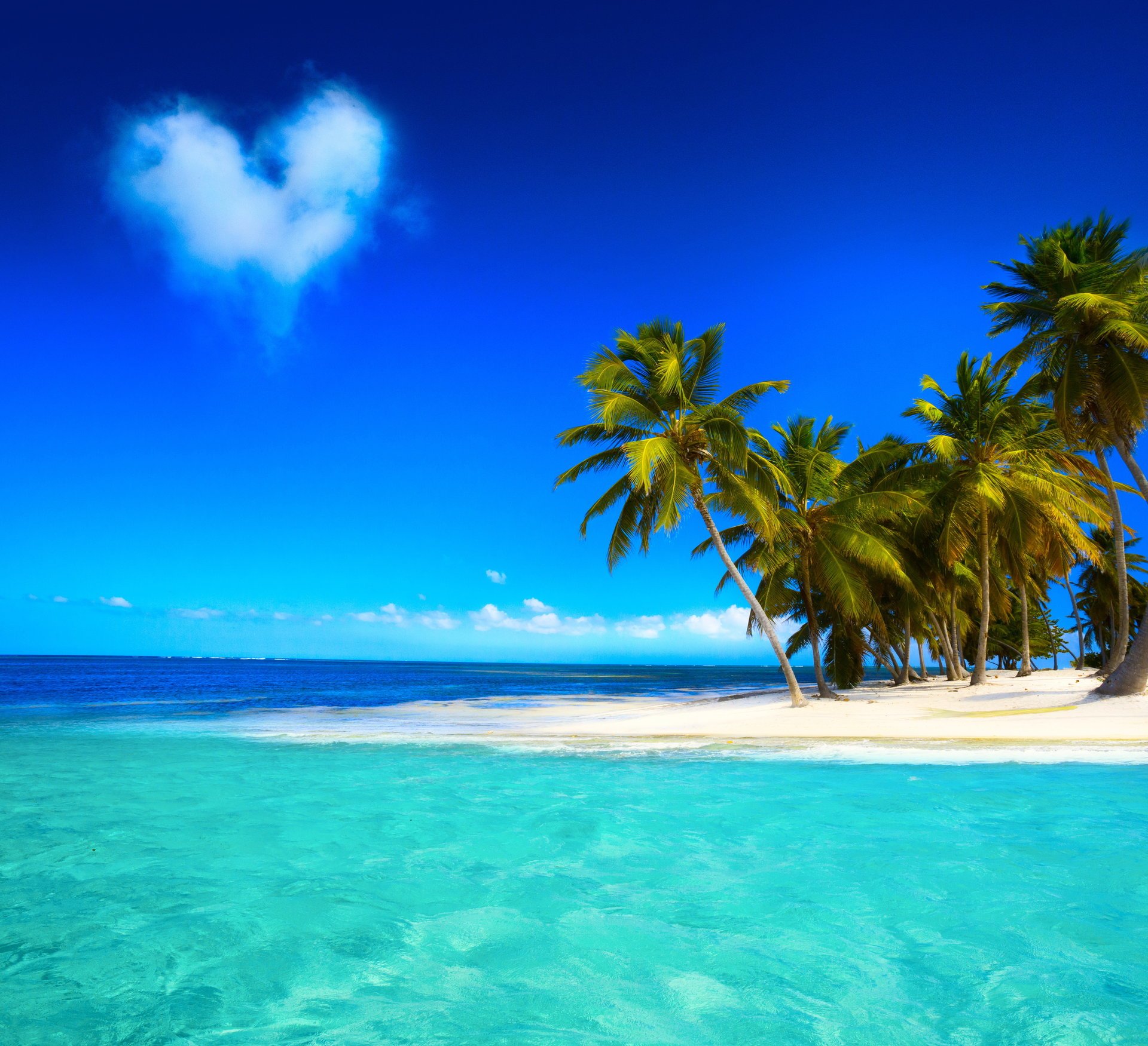 tropical paradise beach coast sea blue emerald ocean palm summer sand vacation cloud tropics sun island shore