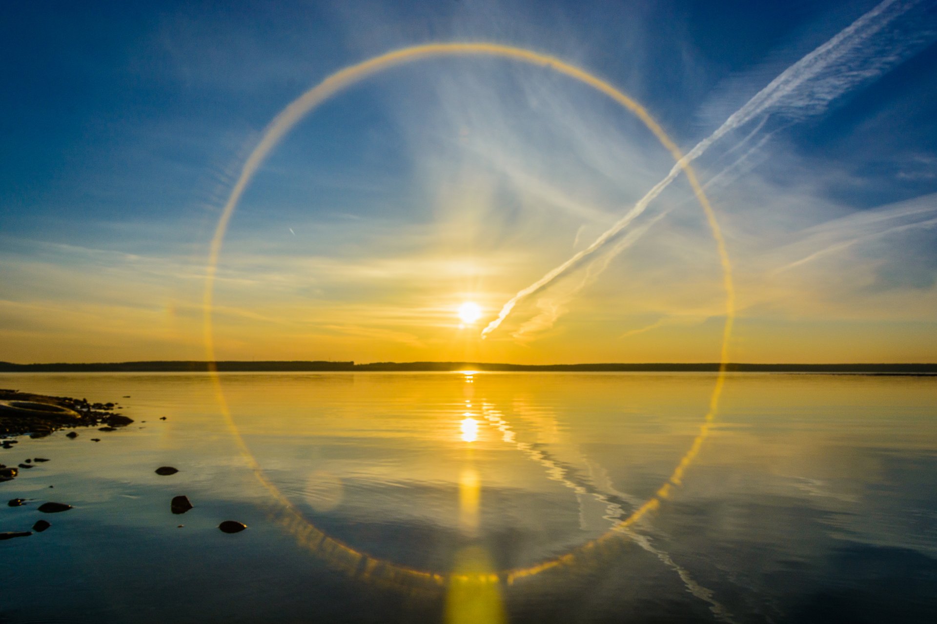 lake sun halo reflection