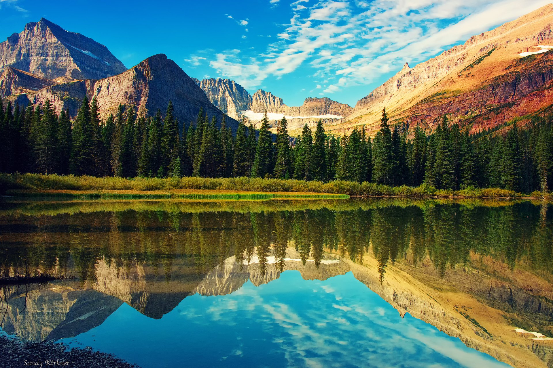 montagne rocciose glacier national park monte grinnell lago foresta cielo riflessioni