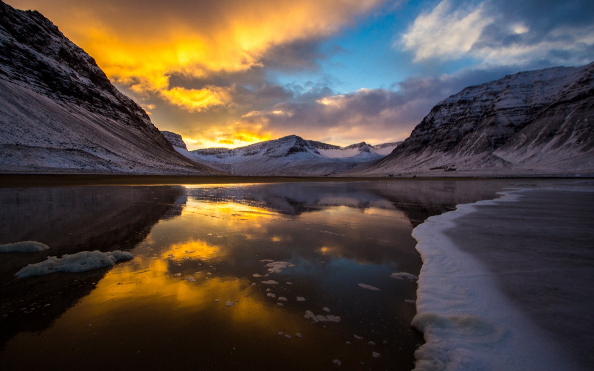 lago montañas puesta de sol hielo frío nieve nubes