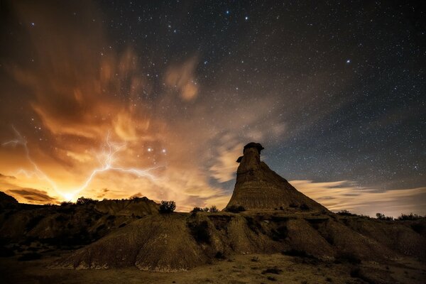 Spanish desert with rocks with lightning