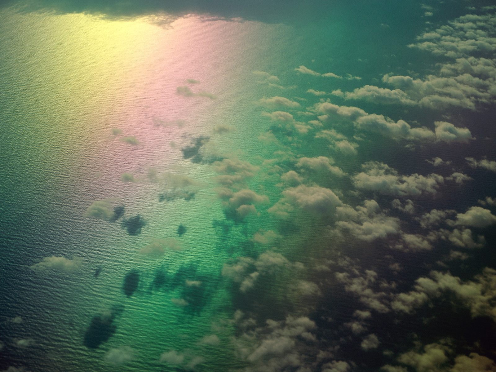 rainbow clouds ocean