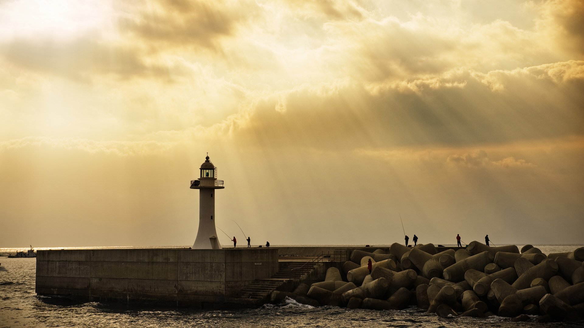 meer leuchtturm angeln sonnenstrahlen