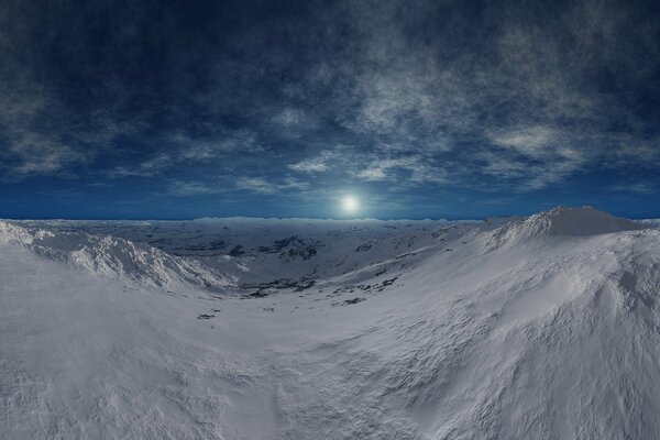 Snow-capped mountains against the sky