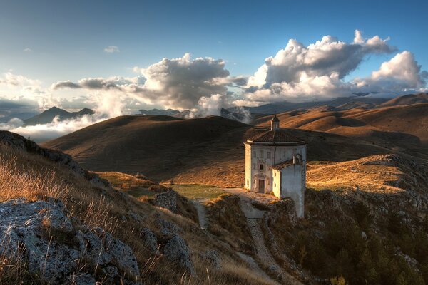 The church is surrounded by mountains