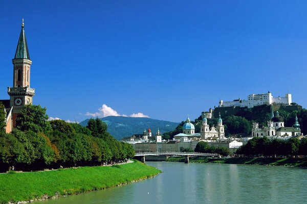 A town with a chapel on the river bank